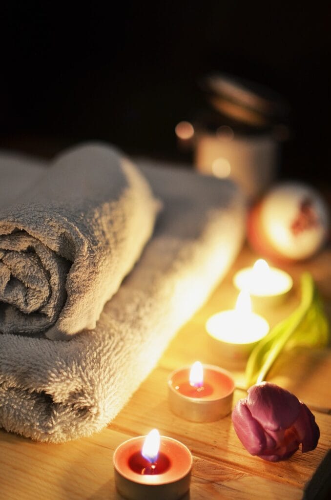 massage therapy, candles, relaxation, treatment, luxury, spa, massage, towels, tea candles, candlelight, spa treatment, spa, spa, spa, spa, spa, massage-1584711.jpg